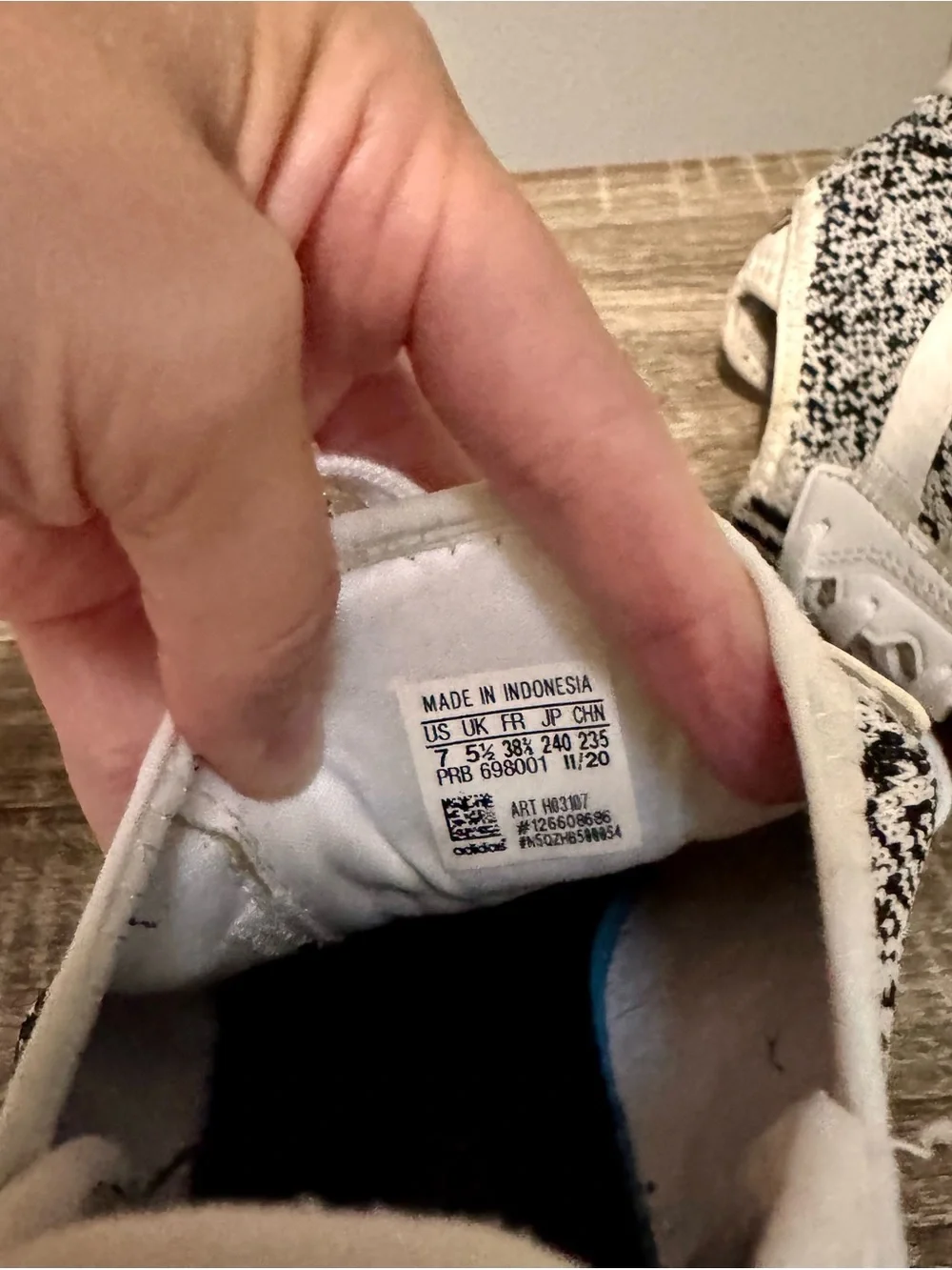 Adidas women’s white and Black Knit Sneaker